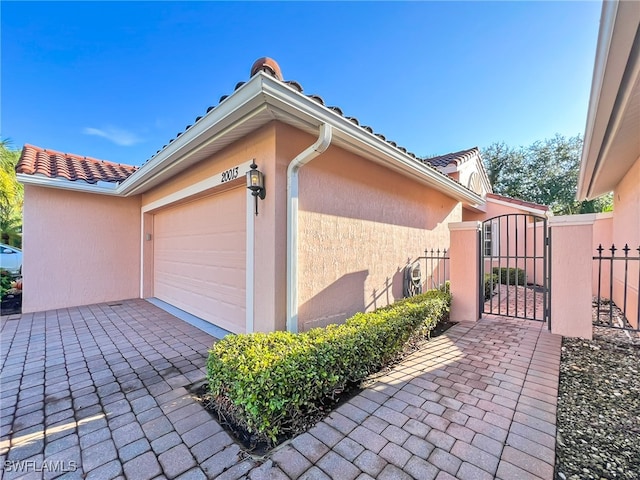 view of home's exterior featuring a garage