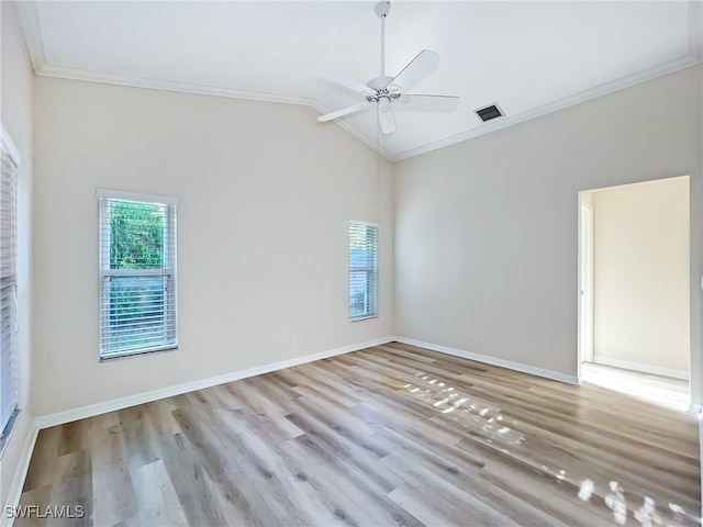 unfurnished room with ceiling fan, ornamental molding, light hardwood / wood-style floors, and lofted ceiling