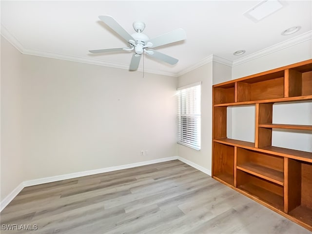 unfurnished bedroom featuring ceiling fan, crown molding, and light hardwood / wood-style floors