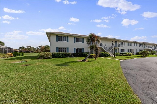 view of front of home with a front lawn