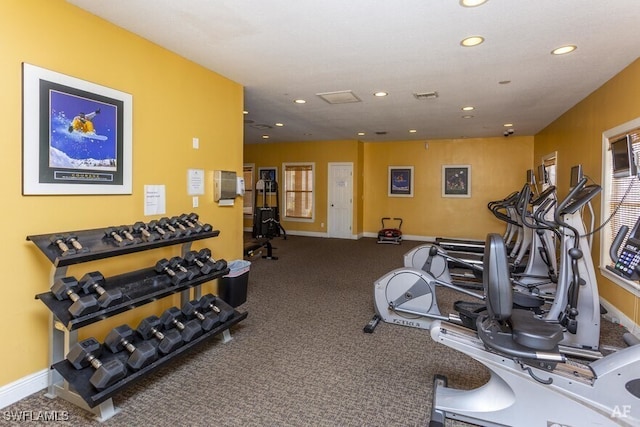 workout area featuring carpet floors