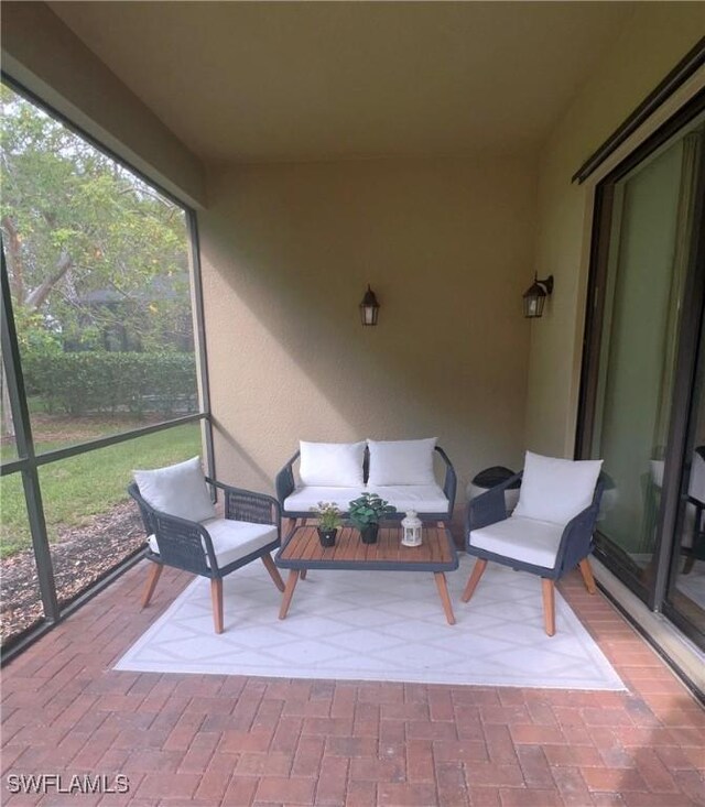 3195 Pacific Dr, Naples, FL 34119 - sunroom featuring an outdoor living space