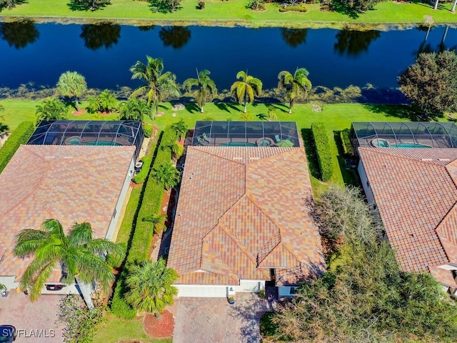 drone / aerial view with a water view