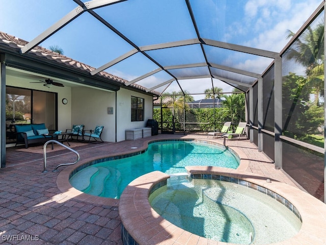 view of pool featuring a patio, an outdoor hangout area, a lanai, a grill, and a pool with connected hot tub