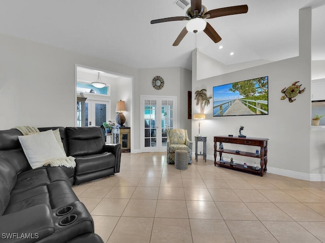 living room featuring vaulted ceiling, ceiling fan, light tile patterned floors, and french doors