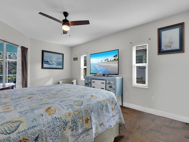 bedroom with dark wood-type flooring and ceiling fan