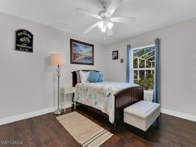 bedroom with ceiling fan and dark hardwood / wood-style floors