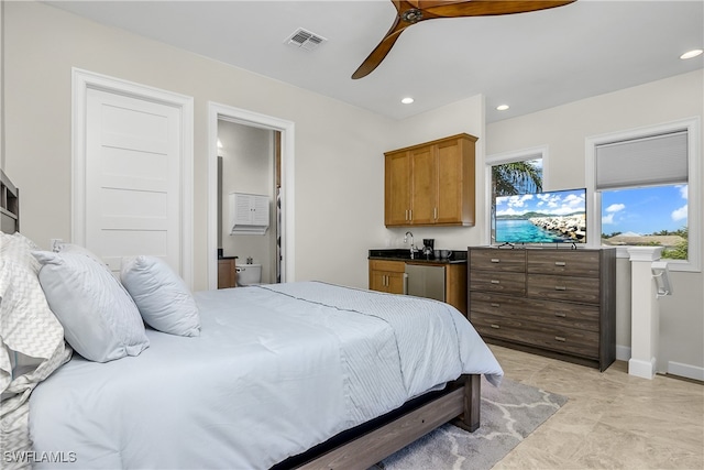 bedroom featuring ensuite bath, stainless steel fridge, and ceiling fan