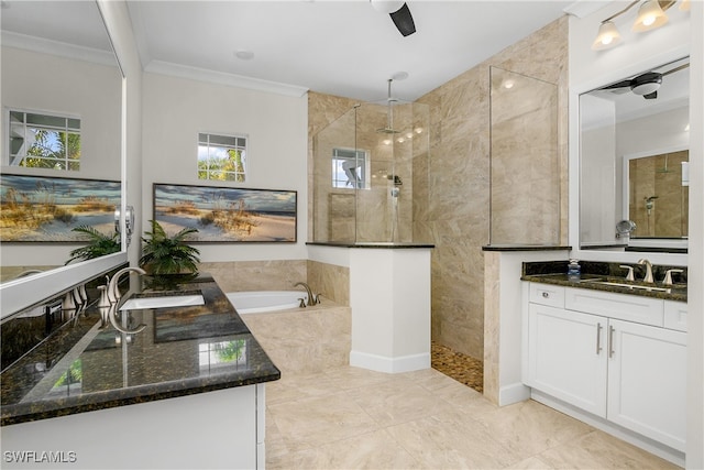 bathroom featuring vanity, crown molding, shower with separate bathtub, and ceiling fan