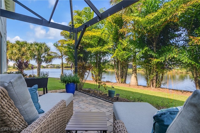 view of patio featuring a water view and an outdoor living space