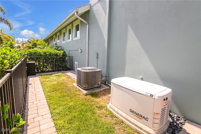 view of yard featuring central AC unit