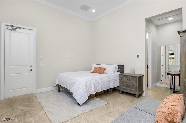 bedroom with crown molding