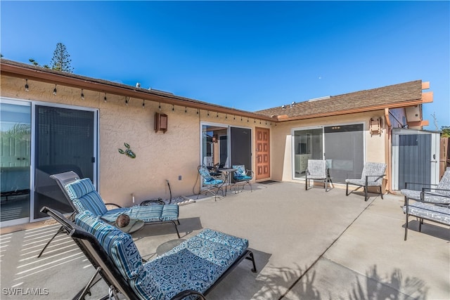 rear view of property with a patio area