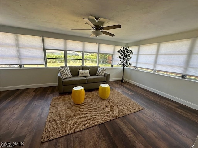 sunroom with ceiling fan