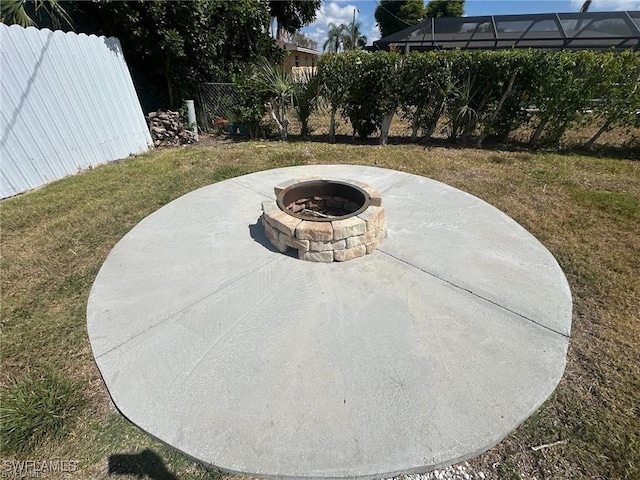 view of patio featuring an outdoor fire pit