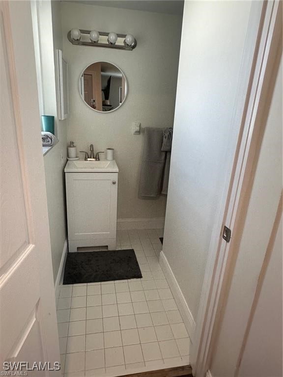 bathroom featuring vanity and tile patterned flooring