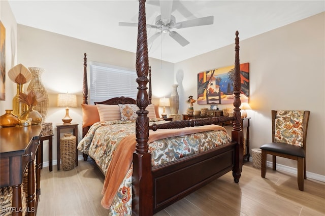 bedroom featuring light hardwood / wood-style flooring and ceiling fan