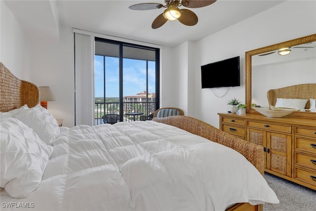 carpeted bedroom with a wall of windows, ceiling fan, and access to outside