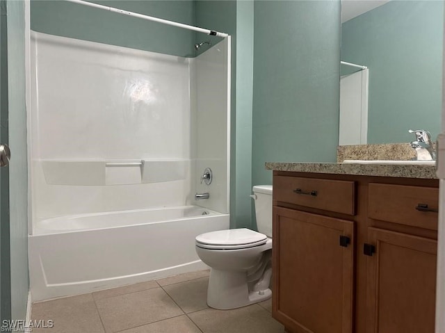 full bathroom with tile patterned floors, vanity, toilet, and  shower combination