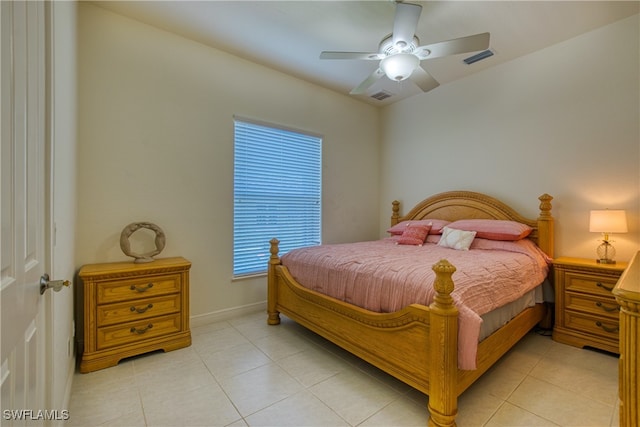 bedroom with light tile patterned floors and ceiling fan