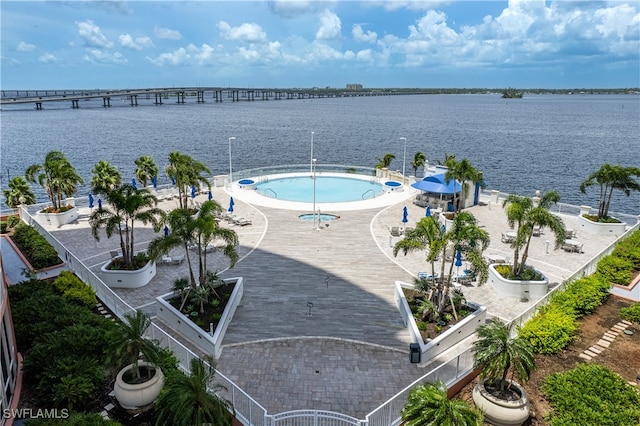 bird's eye view with a water view