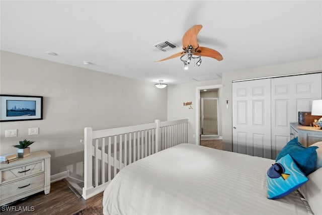 bedroom featuring a closet, dark wood-type flooring, and ceiling fan