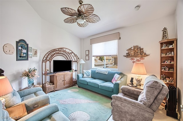 living room featuring lofted ceiling and ceiling fan