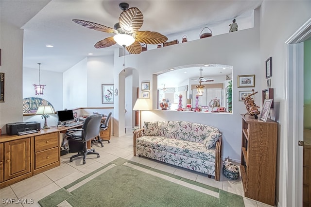 office area with light tile patterned flooring, recessed lighting, arched walkways, and ceiling fan