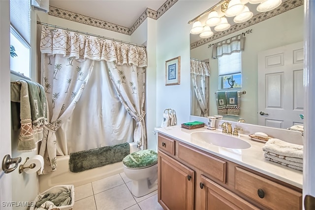 full bathroom featuring vanity, toilet, shower / bath combo with shower curtain, and tile patterned flooring