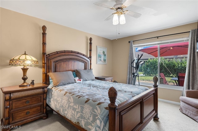 bedroom with ceiling fan and light colored carpet