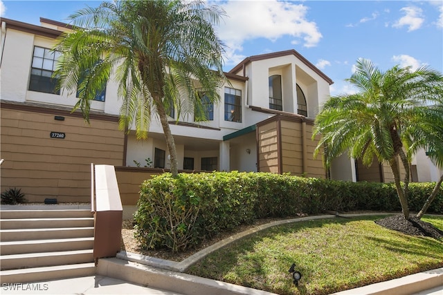 view of front of house with a front yard