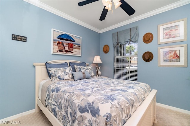 bedroom featuring ornamental molding, light colored carpet, and ceiling fan