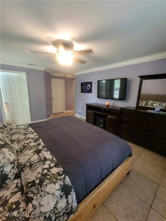 tiled bedroom with crown molding and ceiling fan