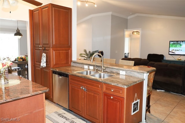 kitchen featuring sink, a breakfast bar, dishwasher, light stone countertops, and decorative light fixtures