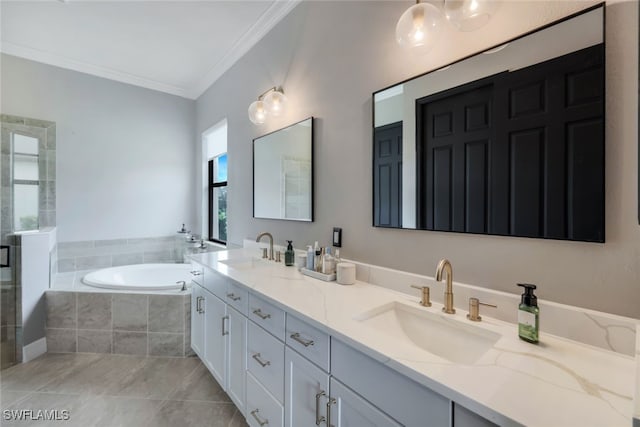 bathroom featuring vanity, crown molding, tiled tub, and tile patterned flooring