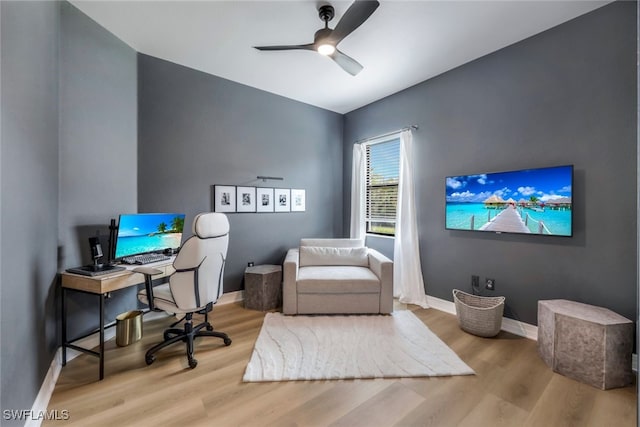 office area featuring light hardwood / wood-style floors and ceiling fan