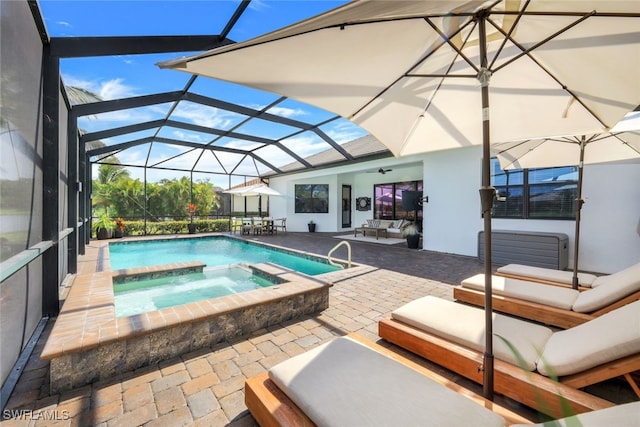 view of swimming pool with a patio, outdoor lounge area, an in ground hot tub, and glass enclosure