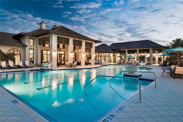 view of pool featuring a patio