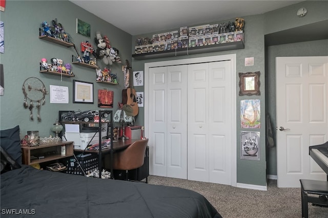 bedroom featuring a closet and carpet