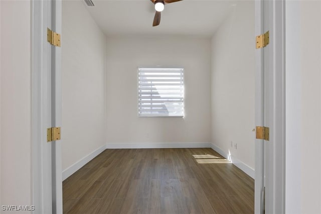 209 Kismet Pkwy E, Cape Coral, FL 33909 - spare room featuring dark wood-type flooring and a ceiling fan