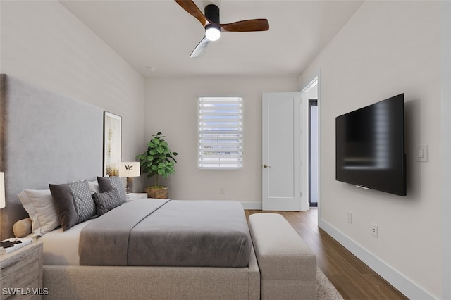 bedroom featuring ceiling fan and hardwood / wood-style flooring