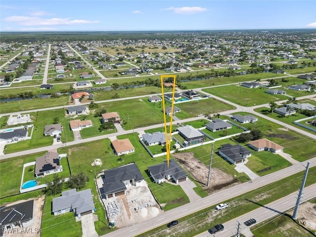 209 Kismet Pkwy E, Cape Coral, FL 33909 - drone / aerial view featuring a residential view