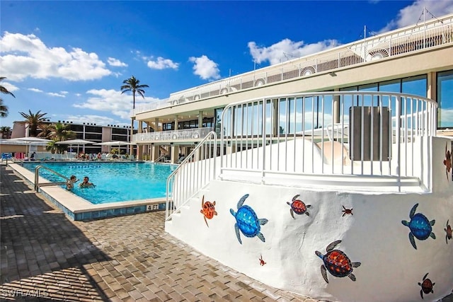 view of pool with a patio area