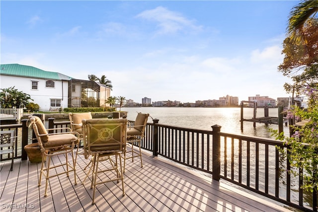 wooden terrace with a water view