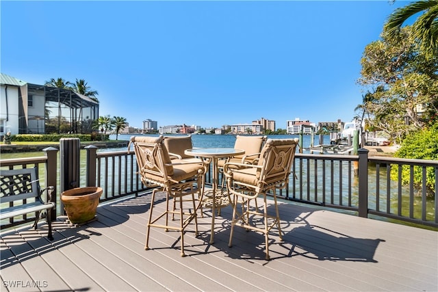 wooden deck with a water view