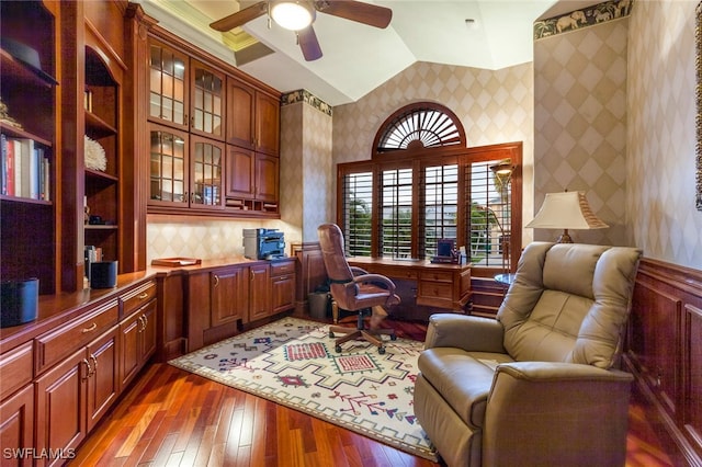 office with built in desk, ceiling fan, hardwood / wood-style flooring, and lofted ceiling