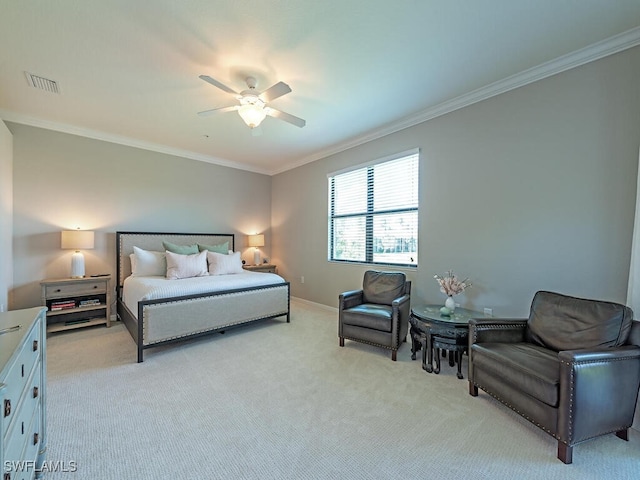 bedroom with ceiling fan, crown molding, and light colored carpet