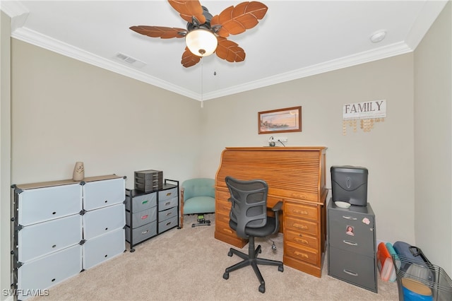 carpeted office space with crown molding and ceiling fan