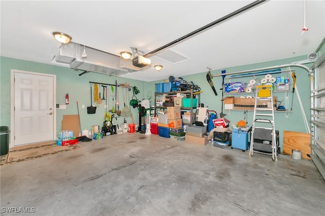 garage featuring a garage door opener