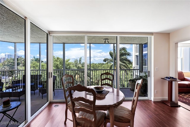 sunroom / solarium featuring a wealth of natural light